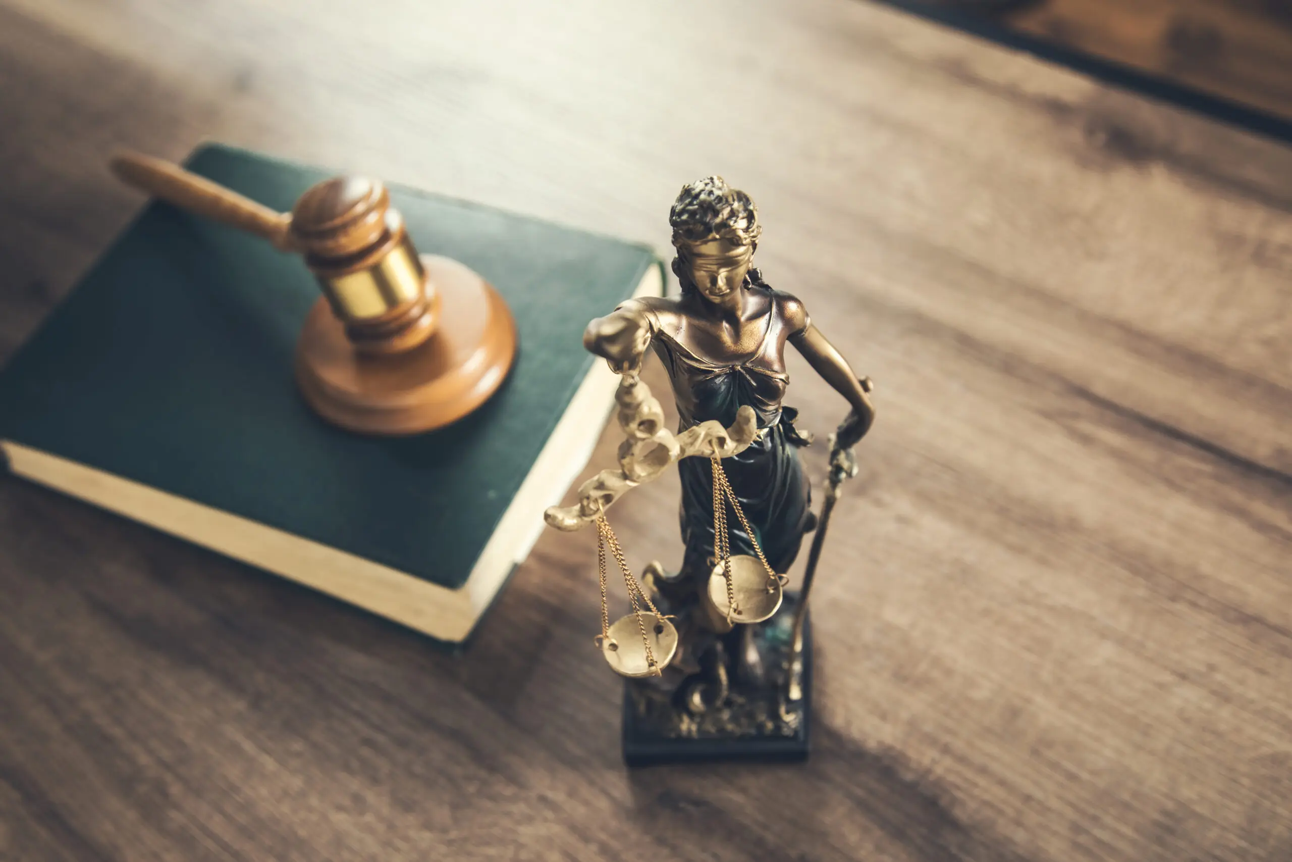 Wooden,Judge,On,Book,With,Justice,Lady,On,Desk